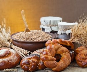 bread-wheat-grains-wooden-backgr